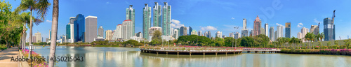 Bangkok City skyline on a beautiful day from the famous Benjakitti Park. Panoramic view © jovannig