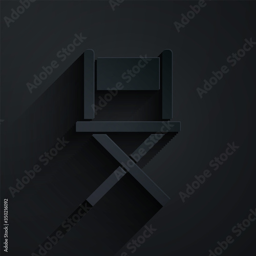 Paper cut Director movie chair icon isolated on black background. Film industry. Paper art style. Vector Illustration