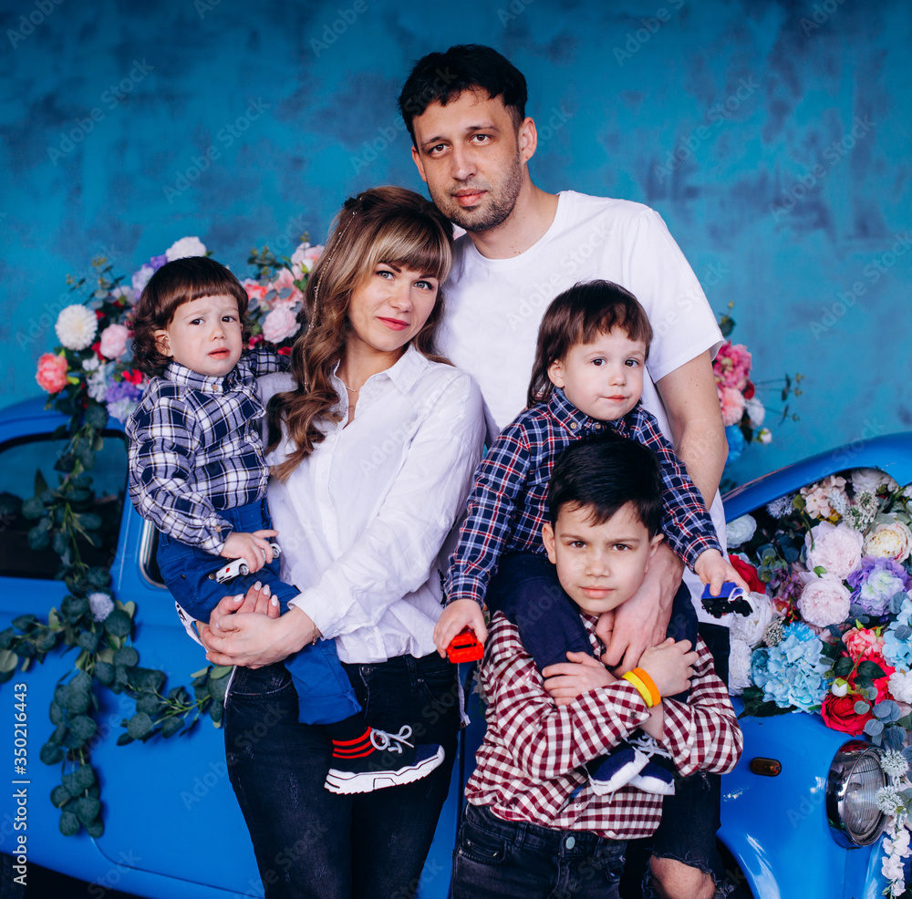 Happy family with father and mother and three sons. Portrait Happy family with father and mother and three sons. Portrait