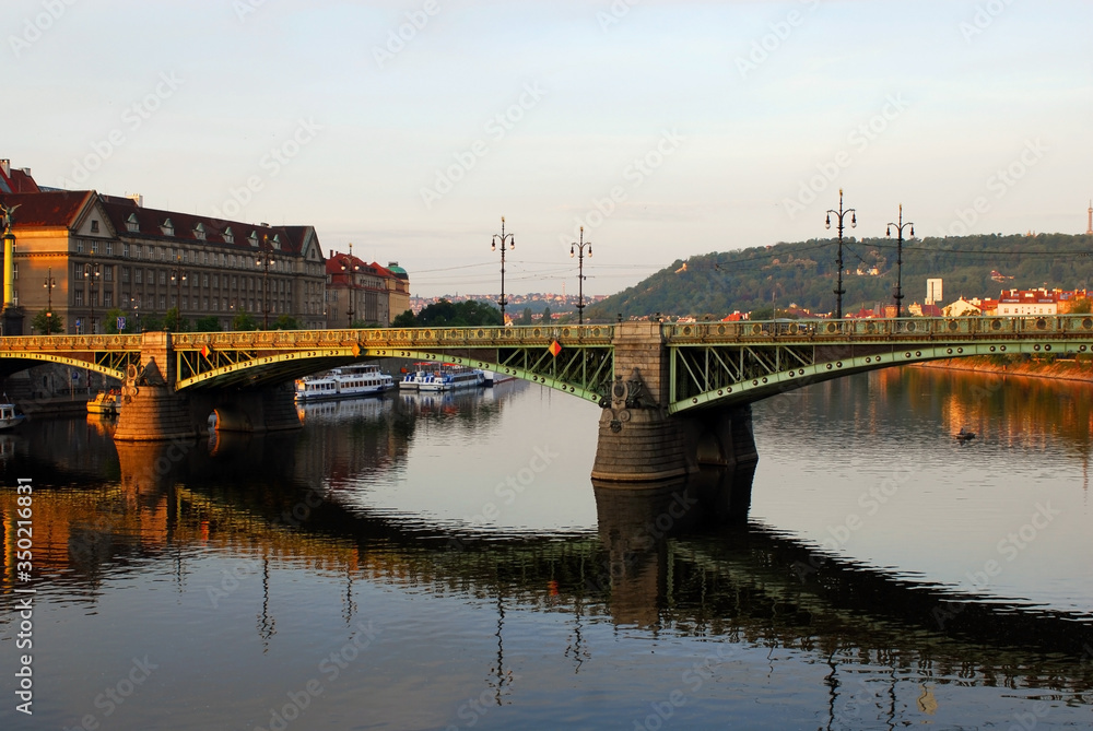 Morning sun send ray in the Bridge in center of Prague