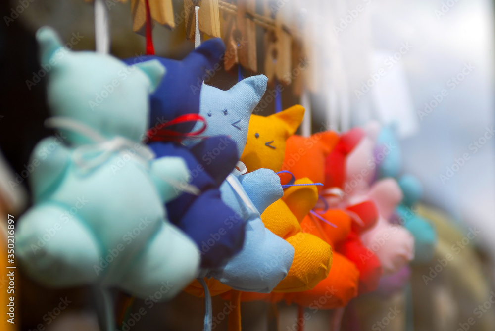 multicolored toys in market in the center of city