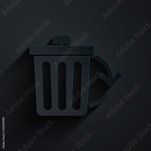 Paper cut Recycle bin with recycle symbol icon isolated on black background. Trash can icon. Garbage bin sign. Recycle basket sign. Paper art style. Vector Illustration