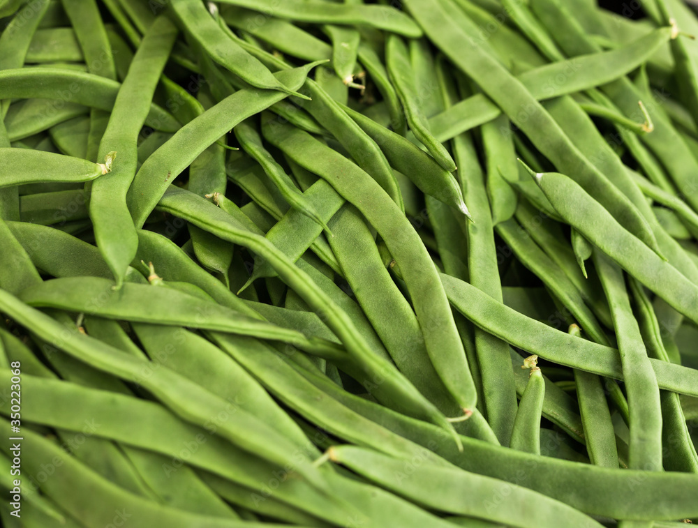green romano beans on the counter in the market green romano beans on the counter in the market