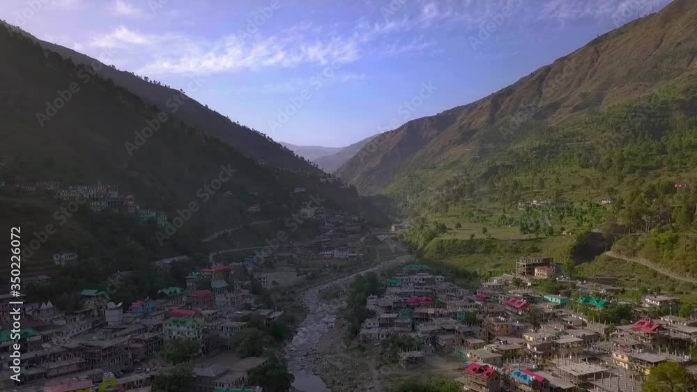 Aerial View Of Nerwa Village In Shimla, Himachal Pradesh, India, Beautiful Drone View Of Valley Surrounded By Green Mountains In Sunny day Day, Travel And Tourist Destination In North India.
Aerial View Of Nerwa Village In Shimla, Himachal Pradesh, India, Beautiful Drone View Of Valley Surrounded By Green Mountains In Sunny day Day, Travel And Tourist Destination In North India.