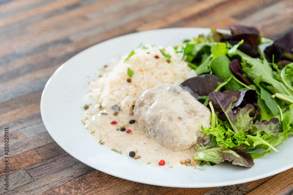 Veal Paupiette stewed with cream and rice Veal Paupiette stewed with cream and rice