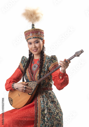 
Kazakh musician plays dombra photo