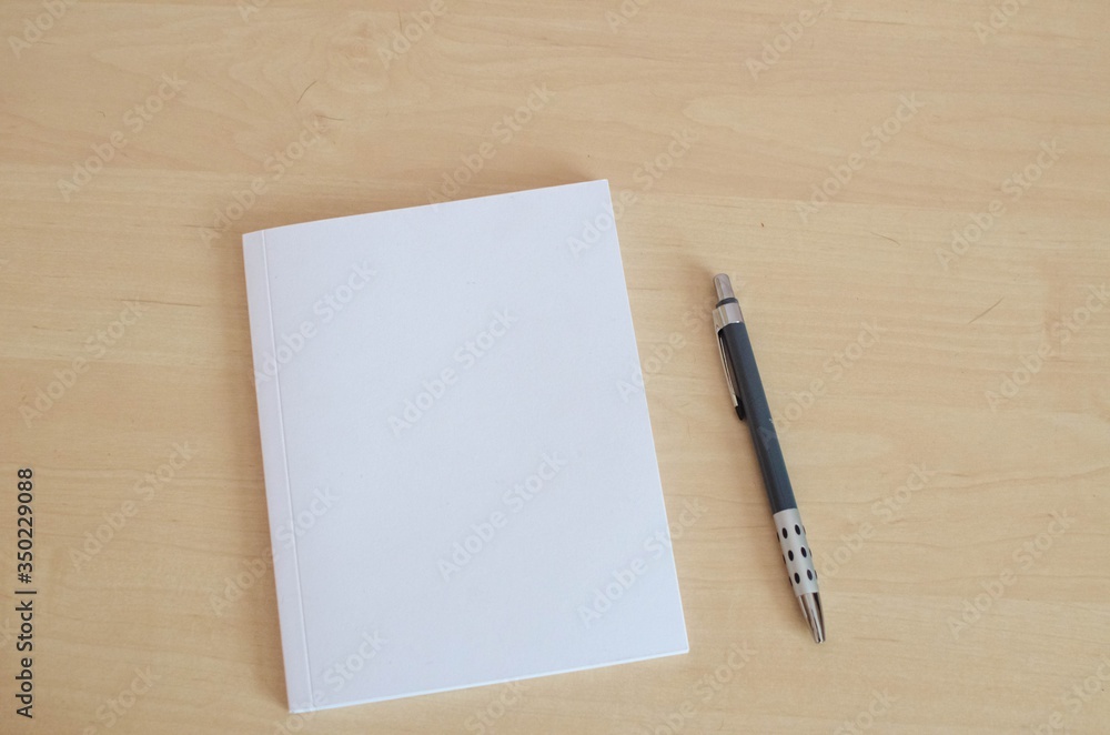 notebook on a white background in the room covid notebook on a white background in the room covid