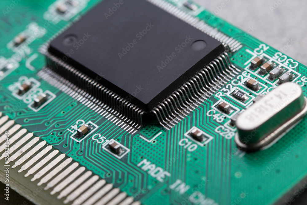 computer processor chip on a circuit board with microchips and other electronic parts CPU Chip on Motherboard computer processor chip on a circuit board with microchips and other electronic parts CPU Chip on Motherboard