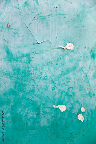 Old wall with peeling blue ...