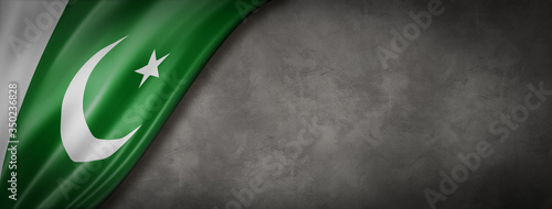 Bild auf Leinwand Pakistani flag on concrete wall banner