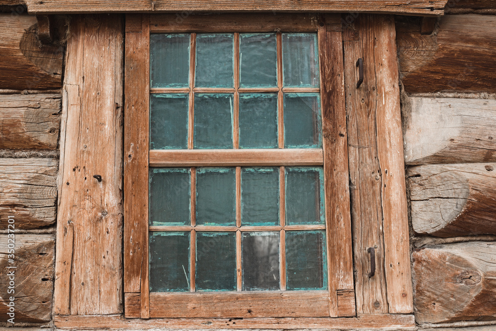 Window of an old wooden house Window of an old wooden house