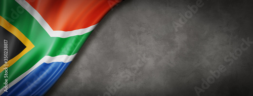 Photos South African flag on concrete wall banner