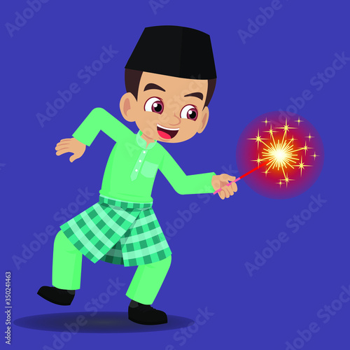 Malay boy playing fireworks during Hari Raya Aidilfitri photo