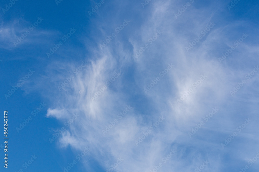Clear blue sky with white clouds. Clear blue sky with white clouds.