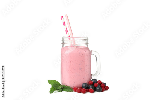 Glass of berry milkshake isolated on white background