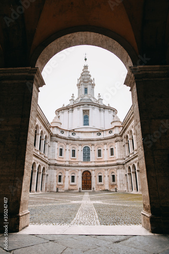 Low angle view of the yard and the baroque church Sant'Ivo della Sapienza, Rome, Italy