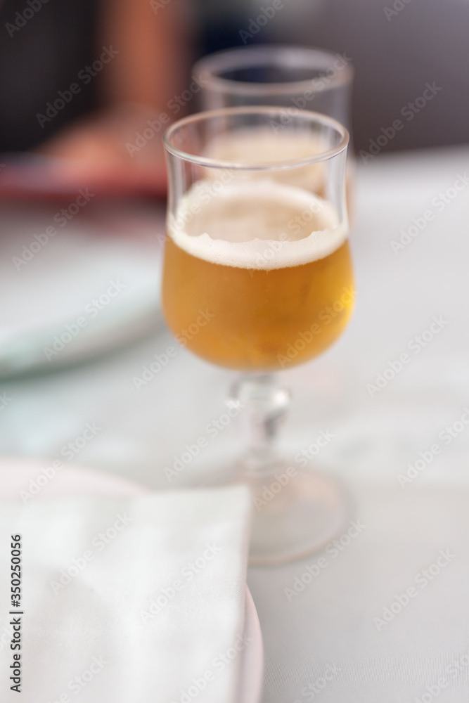 Close up of glass of beer isolated on white background. Close up of glass of beer isolated on white background.