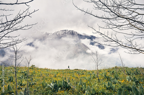 Hiker in the mountains of Kazakhstan photo