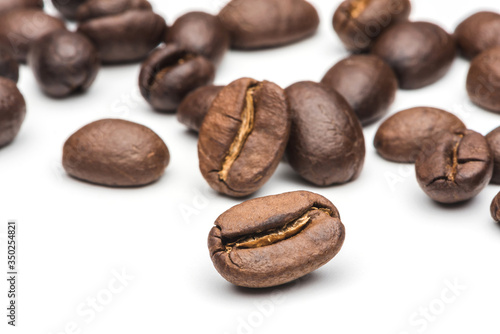 coffee beans roasted on a white background area for copy space.