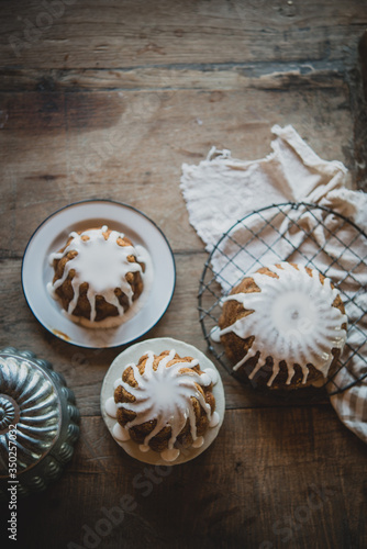 Overhead view of iced cake served on table