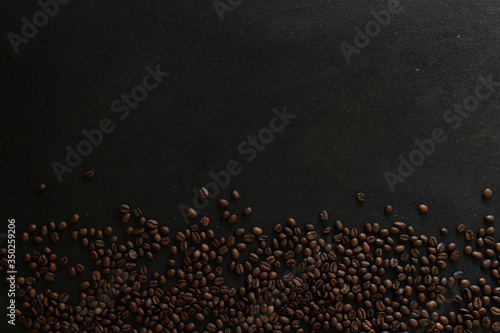 coffee beans on rustic slate background conzept