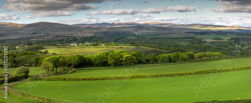 A panoramic landscape of the Brecon Beacons National Park, Powys, South Wales, UK, popular with walkers and cavers. photo