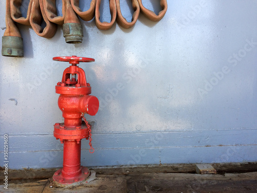 Fire hose hyrdrant red prevention equipment on USS Iowa naval warship destroyer battleship