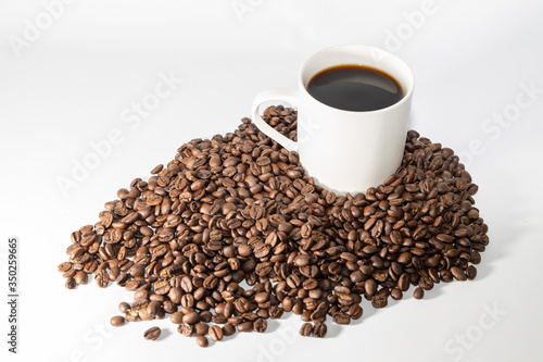 coffee beans and white background © Ken Tyler
