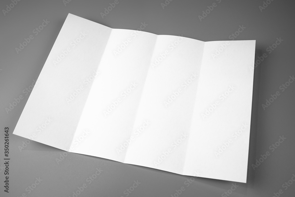 Blank portrait mock-up paper. brochure magazine isolated on gray, changeable background / white paper isolated on gray Blank portrait mock-up paper. brochure magazine isolated on gray, changeable background / white paper isolated on gray