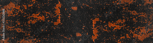 Black orange rustic grunge rusty abstract exfoliated painted spotted metal steel texture background banner panorama
