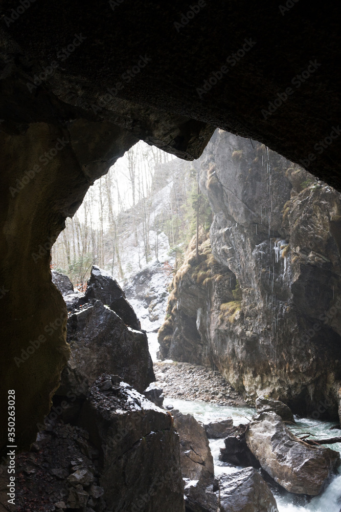 Snow-covered icicles at Partnachklamm, famous tourist destination. Partnachklamm in Garmisch-Partenkirchen, Bavaria, Germany