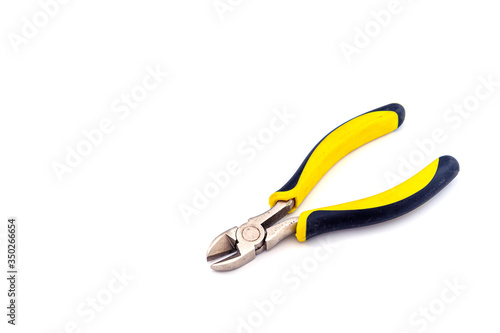 The yellow pliers isolate on the white background.