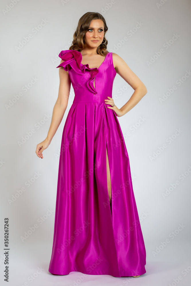 young model posing in purple dress