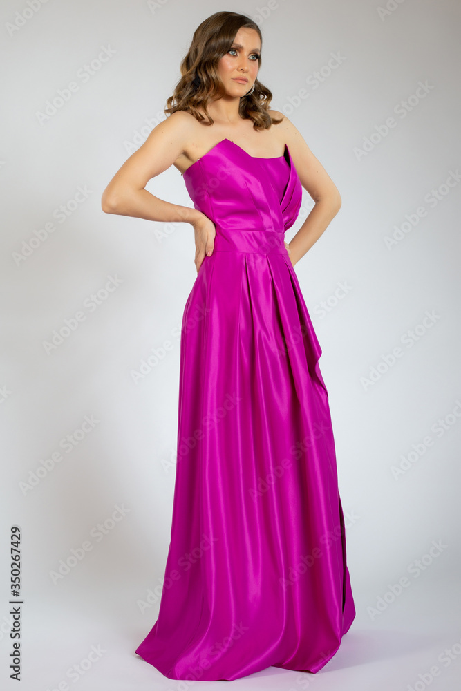 young model posing in purple dress
