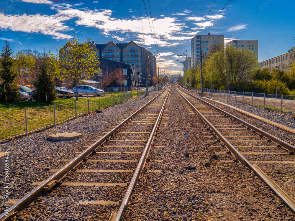 Fototapeta premium perspective of railway tracks in the city