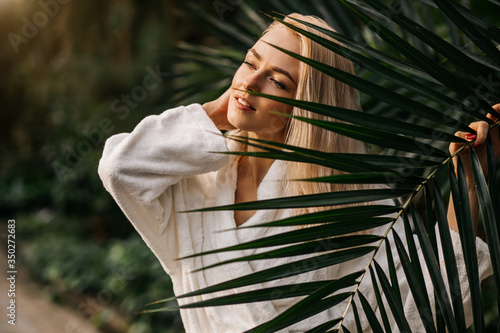 Canvas Print Beautiful young woman in bathrobe