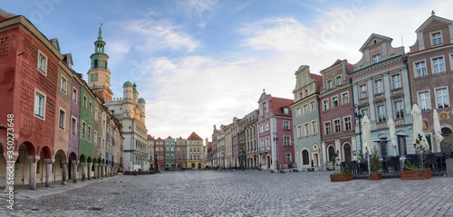 Stary Rynek square with small colorful houses and old Town Hall in Poznan Poland