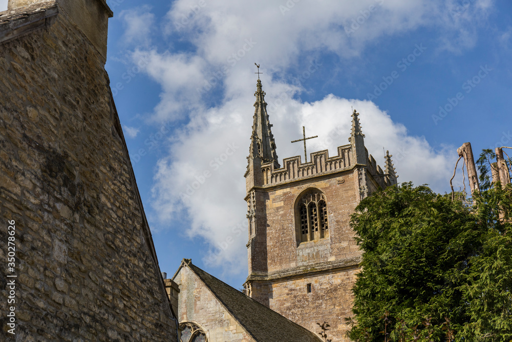 part of a stone church in a southern England village