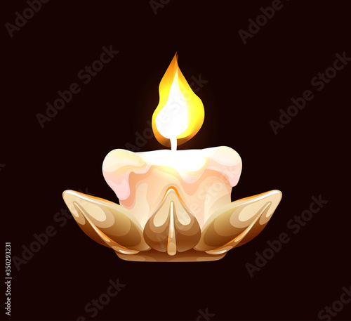 Burning candle in a metallic holder, side view