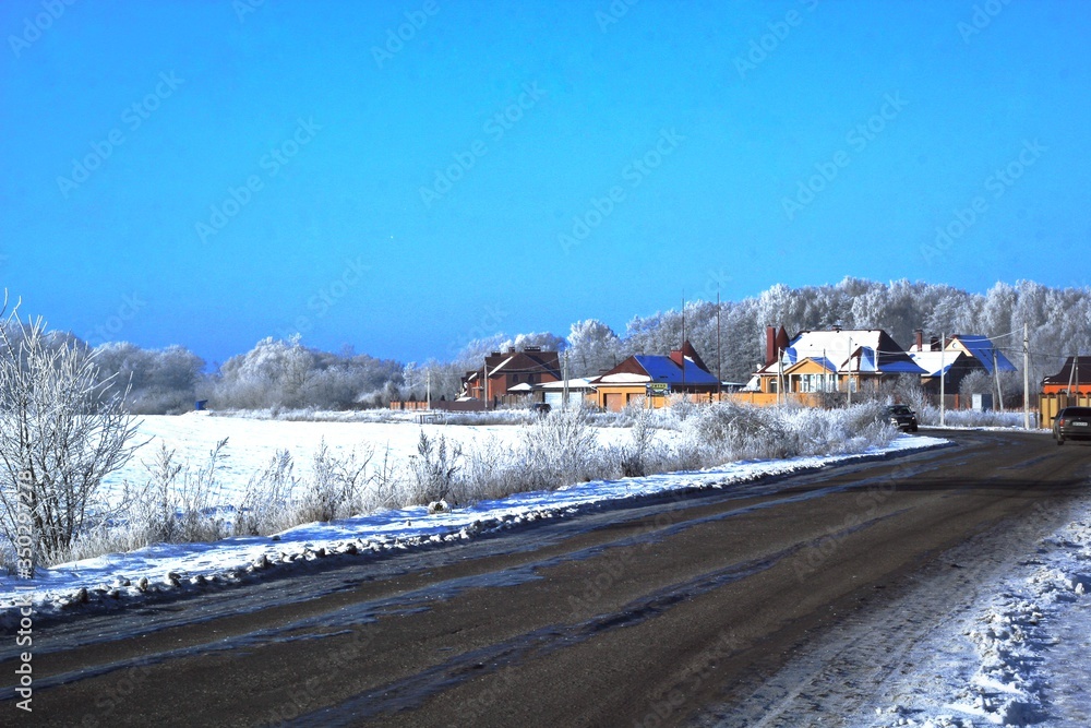 snow covered road outside the city frosty morning beautiful view sunny day snow covered road outside the city frosty morning beautiful view sunny day