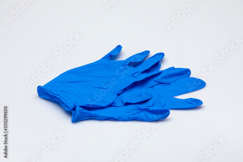 blue surgical gloves isolated on a white background