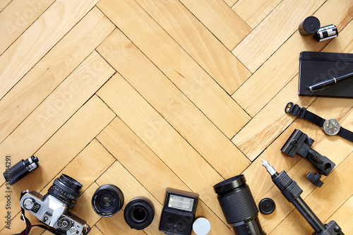 Old type photographic equipment on wooden floor