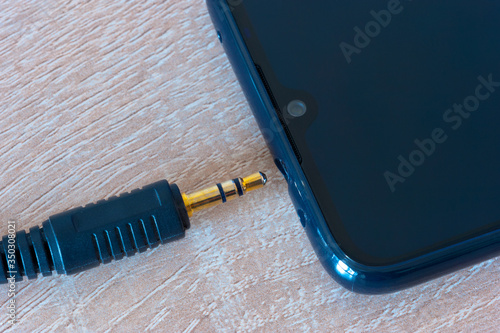 Phone and 3.5 mm earphone Jack.