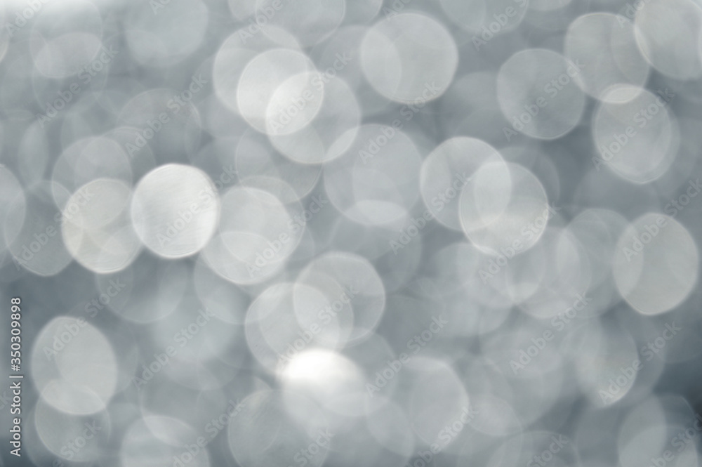 gray abstract bokeh background from nature environment. white blur abstract. Christmas lights gray abstract bokeh background from nature environment. white blur abstract. Christmas lights