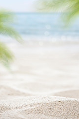 blurred of the sea and sand in the summer for abstract background