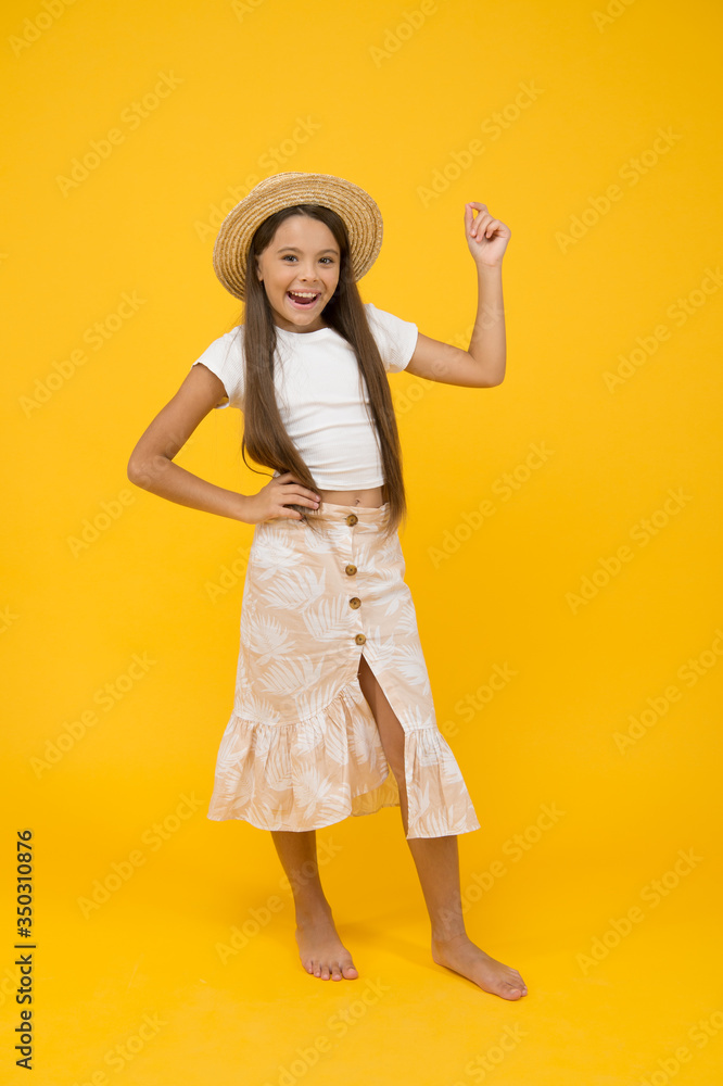 Finally summer vacation. child is resting in warm regions. time to relax. summer holiday and vacation. enjoy beach life. kid summer fashion. small beauty in straw hat. happy childhood Finally summer vacation. child is resting in warm regions. time to relax. summer holiday and vacation. enjoy beach life. kid summer fashion. small beauty in straw hat. happy childhood