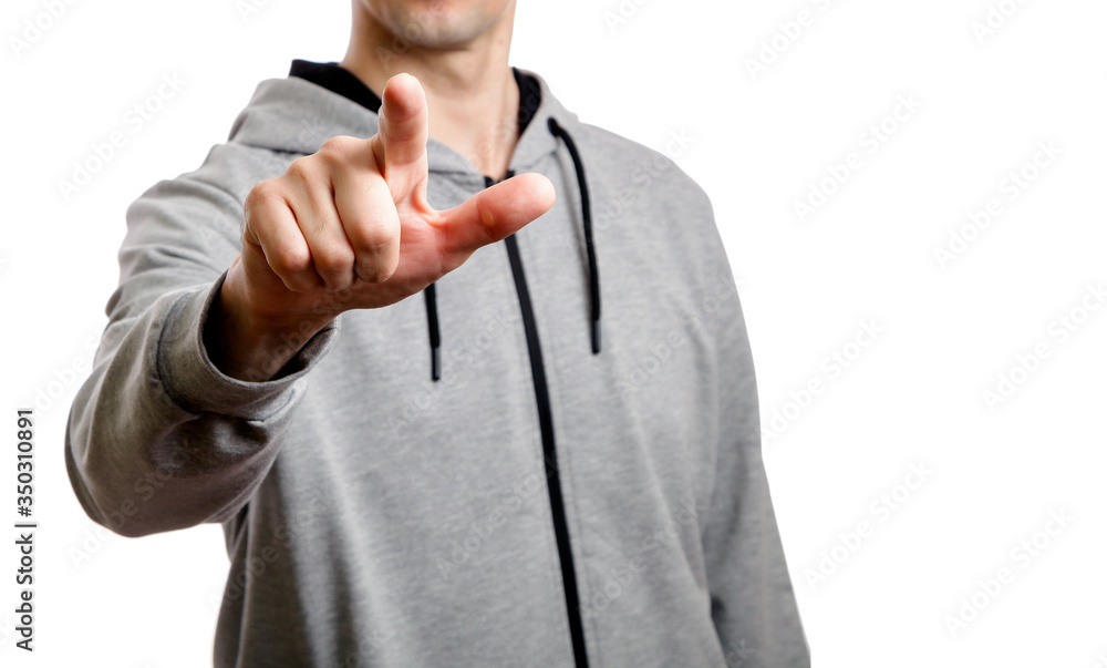 sports man shows his index finger at. Isolated sports man shows his index finger at. Isolated