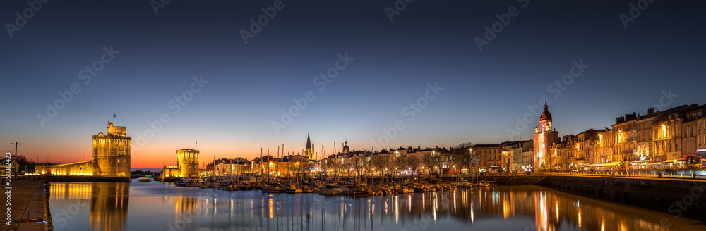 Panoramic view of the old harbour of La Rochelle at sunset