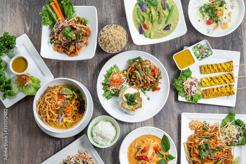 Flat lay of a variety of Thai dishes