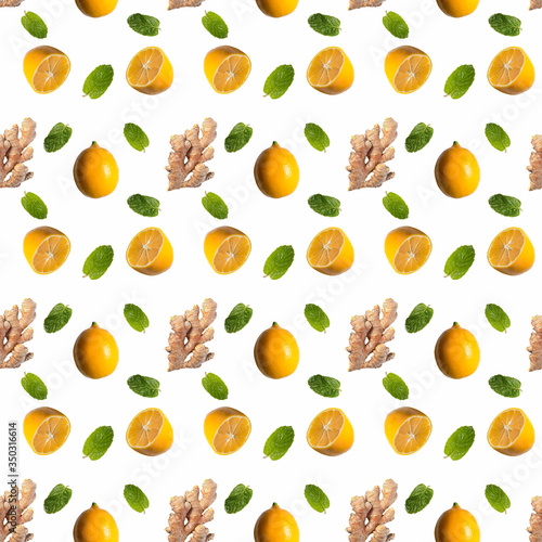 Fototapeta Naklejka Na Ścianę i Meble -  Seamless pattern with ginger root, lemon and mint leaves on a white background. These products enhance the immune system for colds, coronavirus( Covid-19)